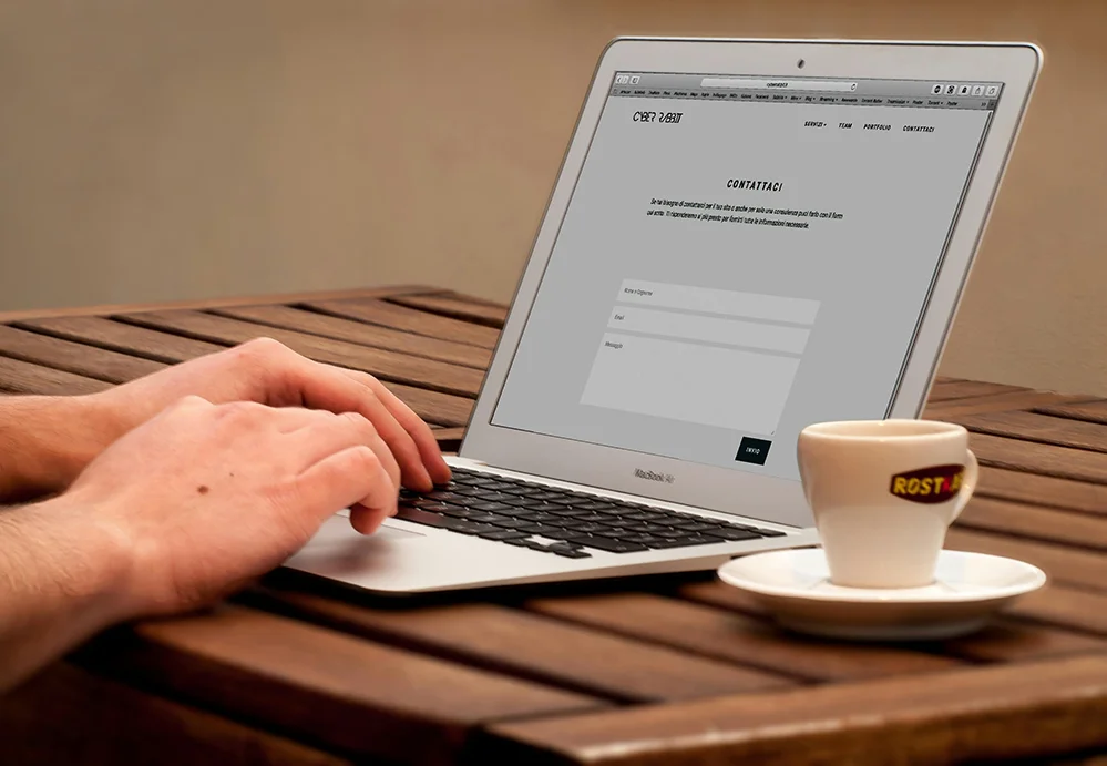What You Should Know Before Launching a Website hand using the laptop keyword and touch mouse